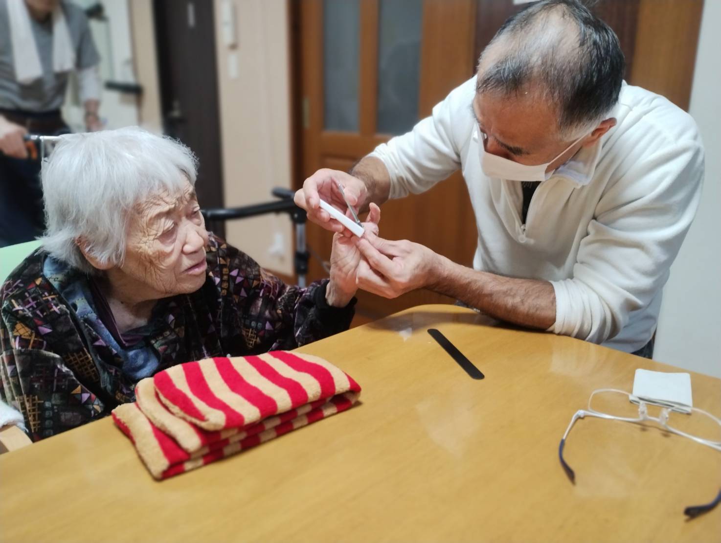 写真：利用者様とスタッフ