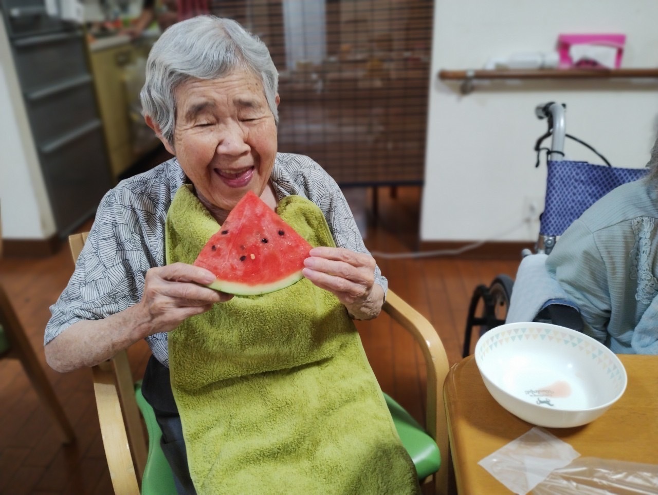 写真：利用者様とスタッフ